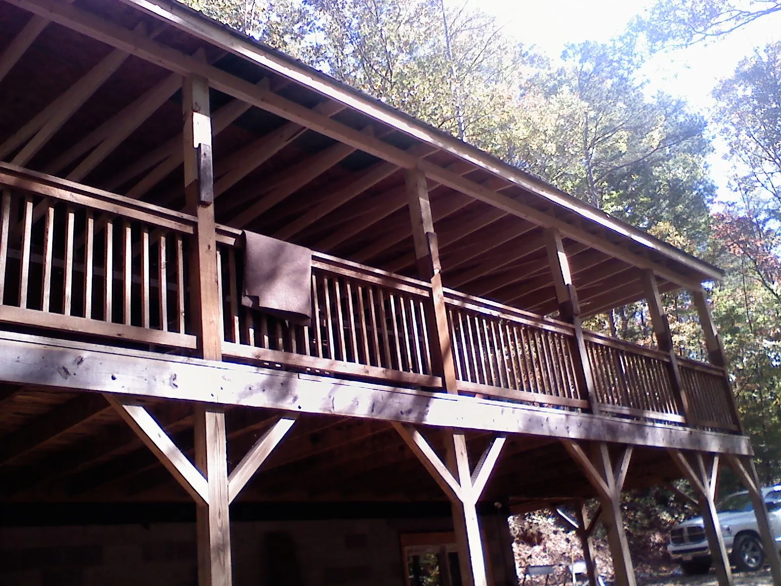 Timber framing under a new elevated porch and deck — Roof Leak Repair in Spokane by Roofing Brothers